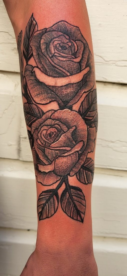 Roses forearm piece in black and gray by Billy at SK-Tattoo1 in Meridian, Mississippi