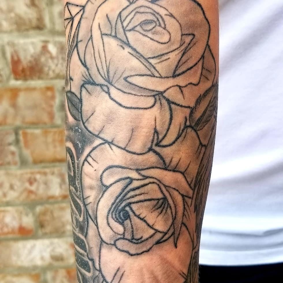Rose half sleeve by Billy at SK-Tattoo1 in Meridian, Mississippi