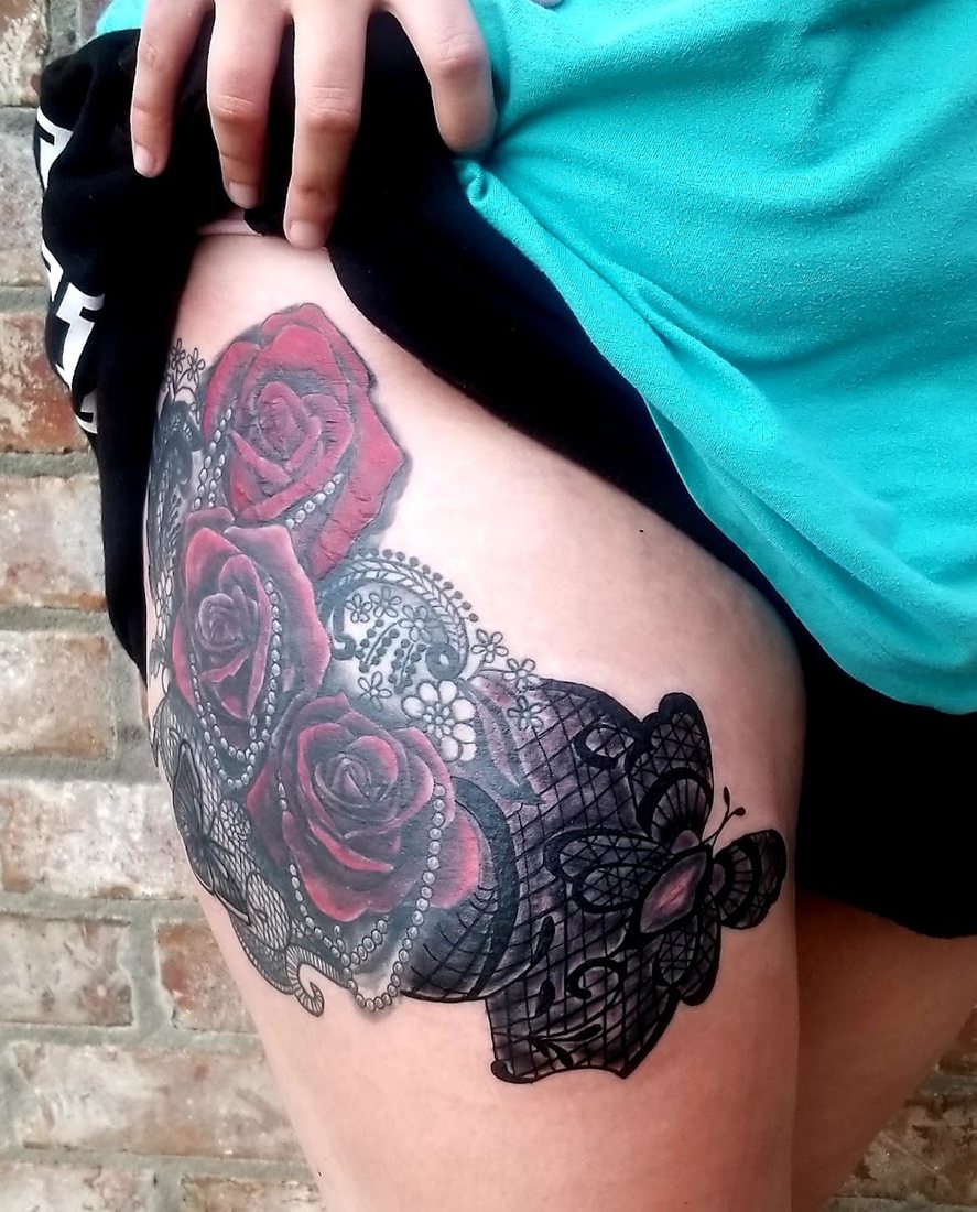 Roses and lace thigh piece by Billy at SK-Tattoo1 in Meridian, Mississippi