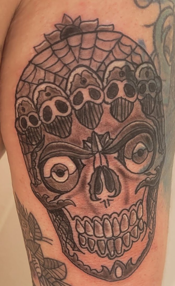 Sugar skull thigh piece by Billy at SK-Tattoo1 in Meridian, Mississippi