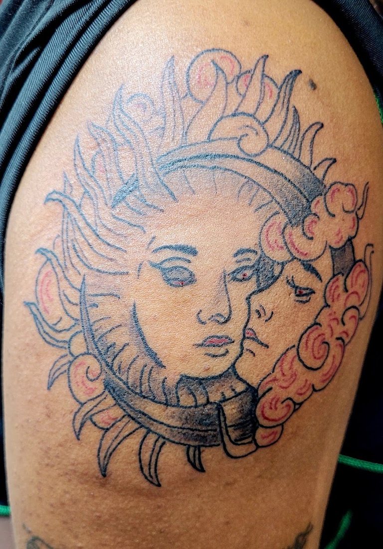 Full color sun and moon thigh piece by Billy at SK-Tattoo1